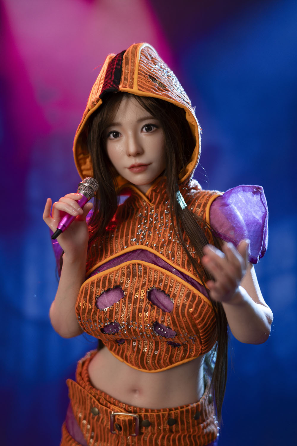 75cm collectible silicone figure in orange stage costume holding a microphone