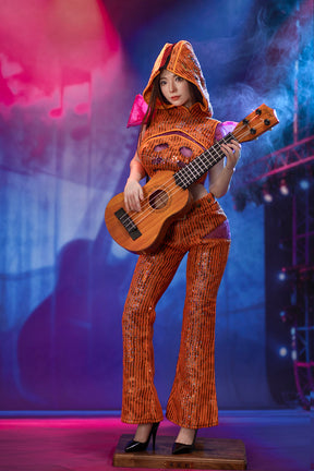 Standing art figure holding a ukulele on stage