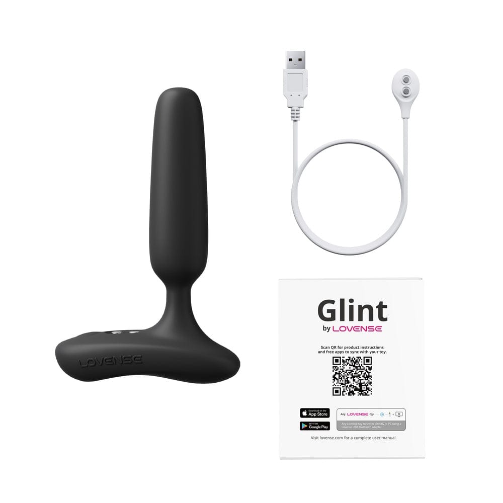 Lovense Glint box contents: smart massager, magnetic USB charging cable and user manual
