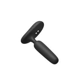 Lovense Glint base close-up with control button and magnetic charging contacts