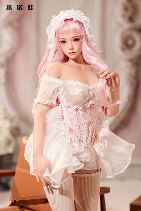 Figure in white lace dress standing