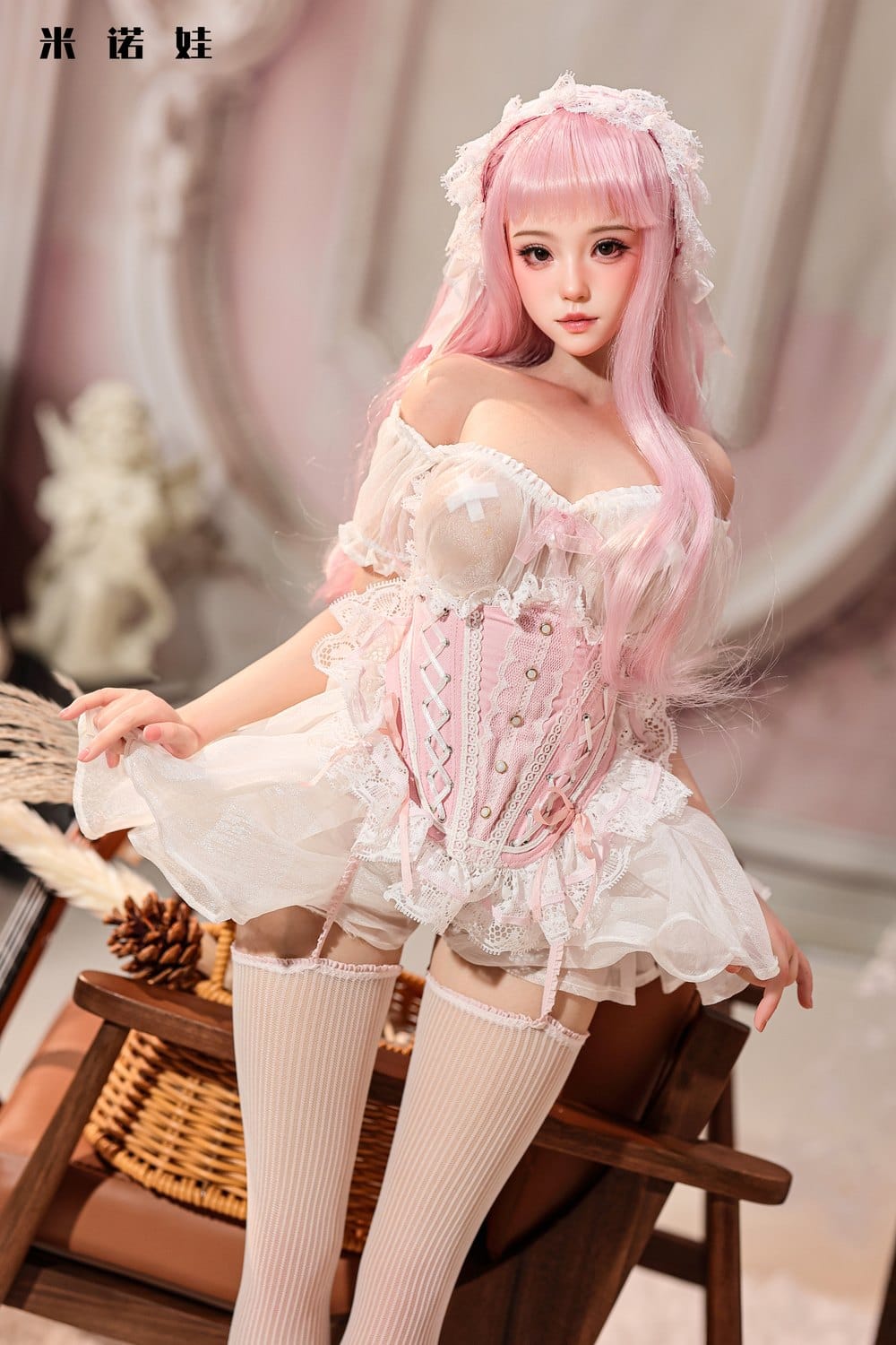 Figure in lace dress seated
