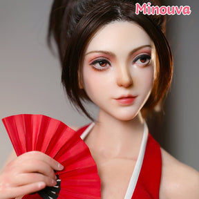 Close-up of hand-painted face with red folding fan